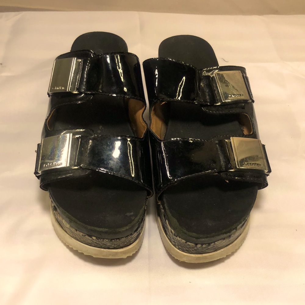 Black patent platforms Calvin Klein